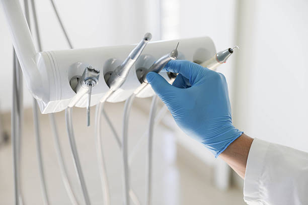 Professional Tooth Extraction technician working in Savannah, GA